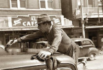 Man_painting_car_top,_San_Antonio,_Tx_,_1939.JPG